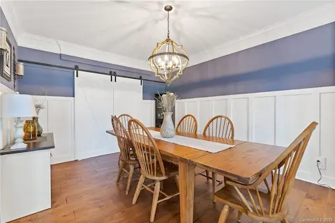 Dining Room with new barn door & wains-coating