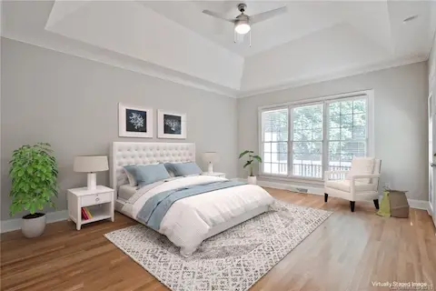 Beautiful Main Level Master Suite, virtually staged
