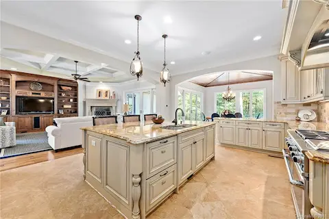 Gourmet kitchen has Dacor range, Subzero fridge, built in coffee maker, Miele full dishwasher, Fisher & Paykel dishwasher drawers and a wine refrigerator.