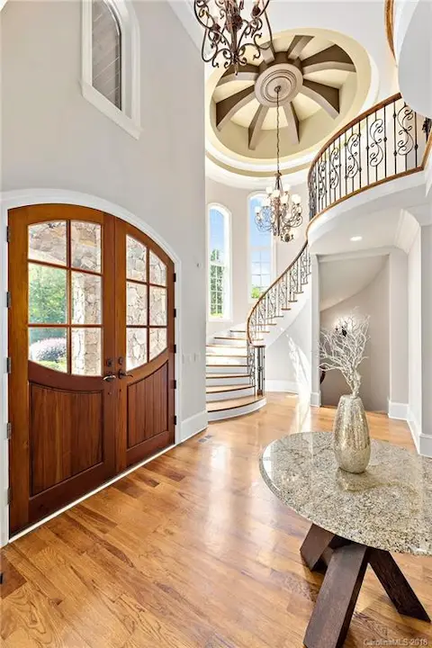 Stunning two story foyer/entryway into this amazing home.
