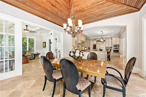 Breakfast area off of the large kitchen opens up to the stunning sunroom as well as the main floor terrace.  Beautiful beadboard ceiling.
