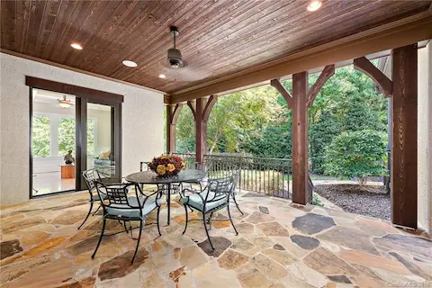 Private side covered porch off of the kitchen area.