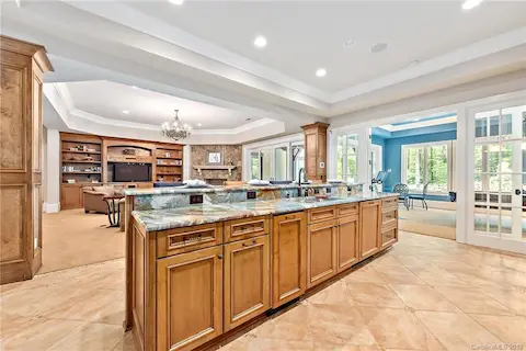 Family room downstairs with bar, entertaining area.  This kitchen has everything but a stove and oven.