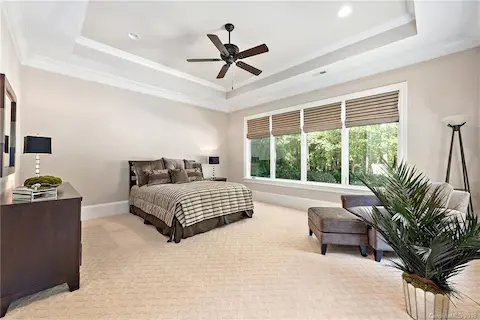 Downstairs bedroom could be second master suite.  Generous sized room with views of the amazing outdoor living areas.
