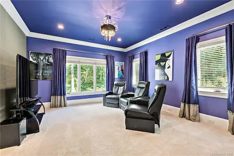 Upstairs media/bedroom with large walk in closet.