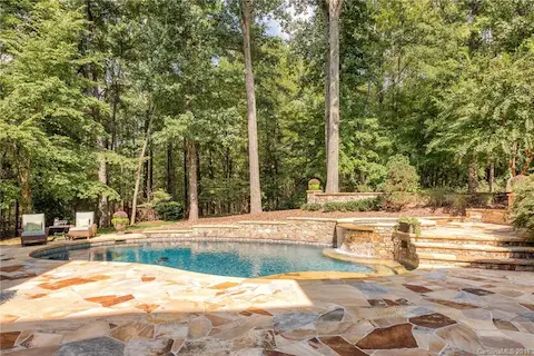 Beautiful saltwater pool and spa with water feature. Plenty of space and privacy to spend your day lounging by the pool.