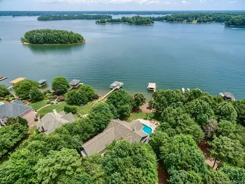 Must see - main channel beauty on the shores of Lake Norman. Very private backyard.  In-Ground pool, Finished basement w/ bar, Private dock and pier, and so much more. Must see today!
