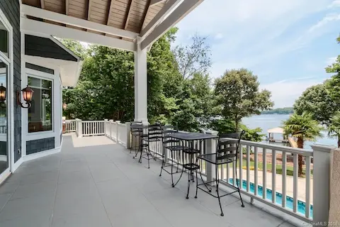 Expansive deck off of the main level, check out that view!  This concrete deck runs the entire length of the main level!  What a great place to take in the amazing views.