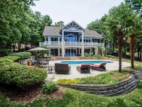 All you can say is WOW!  Big beautiful windows all along the back to capture the beauty of the backyard and your waterfront oasis!