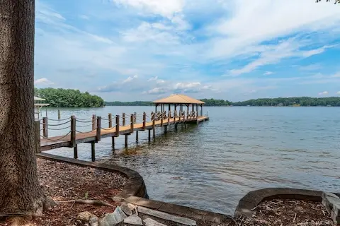 Your private Pier and Dock! Must see - main channel beauty on the shores of Lake Norman.  In-Ground pool, Finished basement w/ bar, Private dock and pier, and so much more. Must see today!