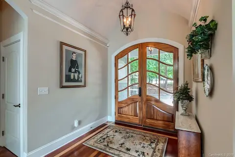 Gorgeous Double Mahogany Front Entry Doors!  This home is stunning!  From the moment you walk in the wall of windows takes you in....must see it.