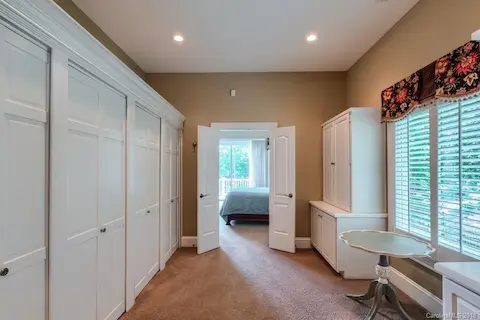 Master Closet and dressing room! Features his and hers built-ins!