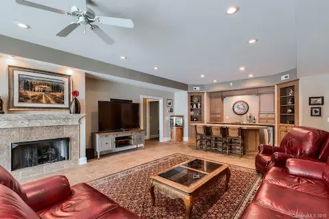 Basement Living Room!  Steps away to the in-ground pool and your waterfront oasis!