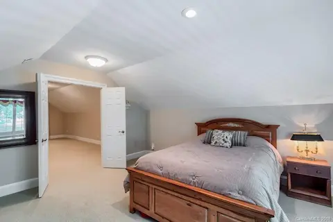 This is the Bonus/FROG rm-  owners use this huge room as a guest room.  French doors divide this room.