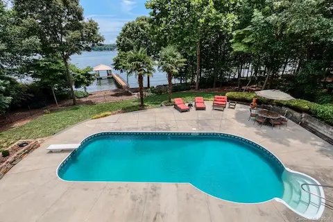 Must see - main channel beauty on the shores of Lake Norman. Very private backyard.  In-Ground pool, Finished basement w/ bar, Private dock and pier, and so much more. Must see today!