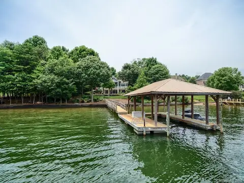 Fantastic Waterfront Home, nice view from the water!   Must see - main channel beauty on the shores of Lake Norman.  In-Ground pool, Finished basement w/ bar, Private dock and pier, and so much more. Must see today!