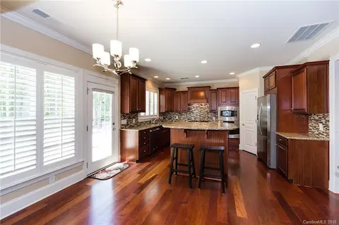 The breakfast nook and the island allow for casual dining for many!