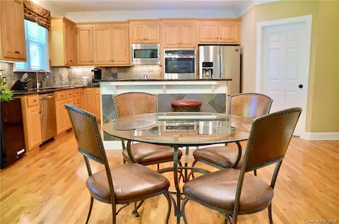 Kitchen has plenty of room for dine in, bar top seating and a great working kitchen with 42" upgraded cabinets.