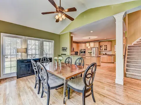 Sunroom, morning room, or breakfast area opening to kitchen