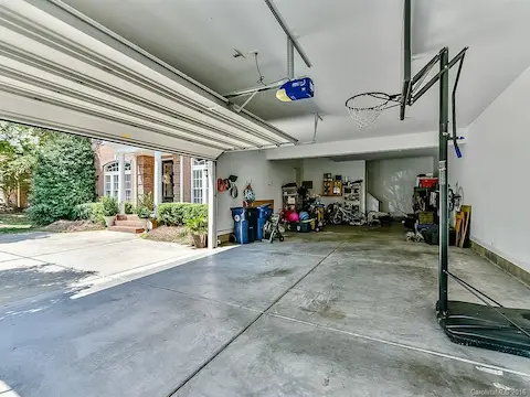 Side load garage/door for two, but room for three!