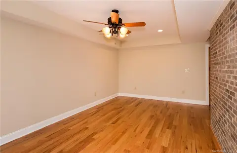 This space in the basement would be perfect place for a pool table or a private sitting area/office