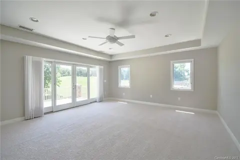 2nd master bedroom on upper level with golf course view