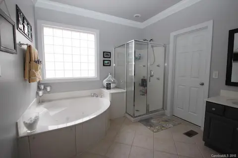 Large jetted tub & shower.