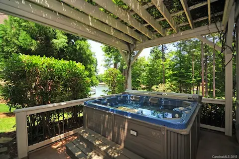 Enjoy a relaxing time in the spa over looking Lake Norman!