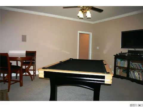 Rec Room - First floor bonus room wired for surround sound with french doors to the covered porch. Access to the pool cabana with second kitchen and full bath.