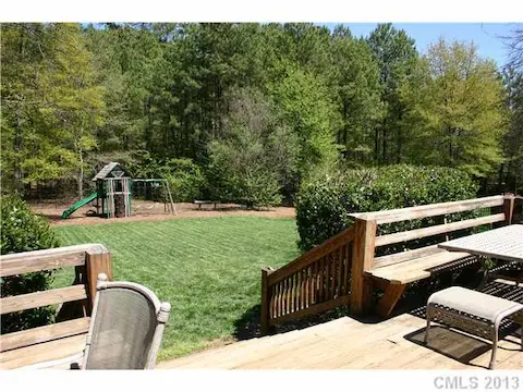 Exterior Back - Lush Landscaping. Large Fenced-in Yard