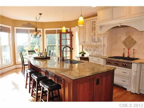 Kitchen - You will fall in love with this beautiful kitchen.  It is fully equioed with a wolf range top, double ovens and built in refigerator,