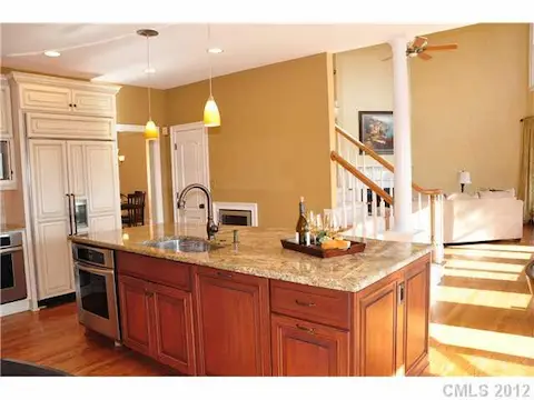 Kitchen - Other added features include a generous pantry and a wine cooler tucked cleverly under the stairs.
