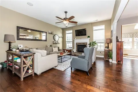Great Room with ceiling fan and gas fireplace