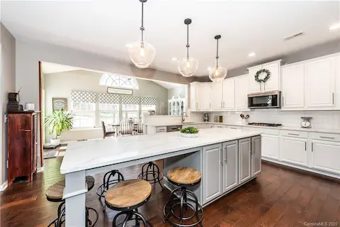 Huge Island - New Quartz countertops, new tile backsplash, and gas cooktop!