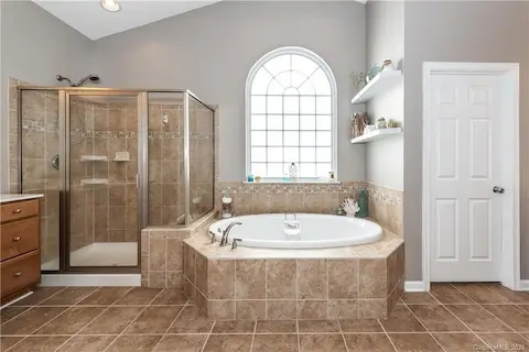 Master ensuite has garden tub and stand alone shower....