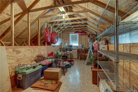 Unfinished attic space fixed staircase