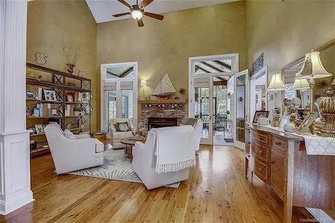 Gorgeous 2 story family room on the main level opens to the kitchen, dining room and screened porch area.