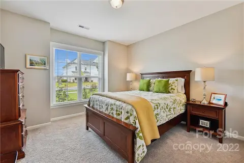 2nd downstairs bedroom with double windows.