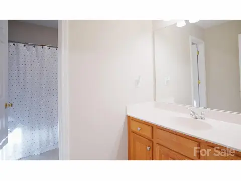 Hall bath with separate shower area