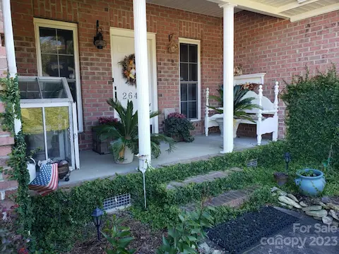 Welcome to your new front porch!  The creeping fig from Charleston is just now starting to come in.  This pic is from last year.