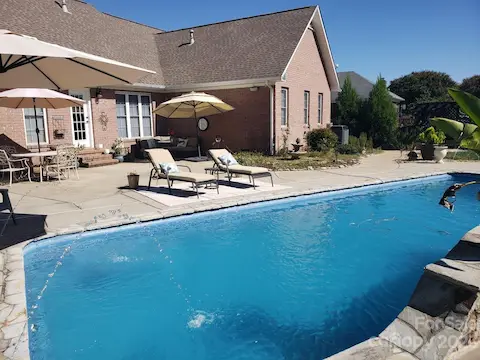 There are built-in under water benches.  You will love to see and hear the waterfall and