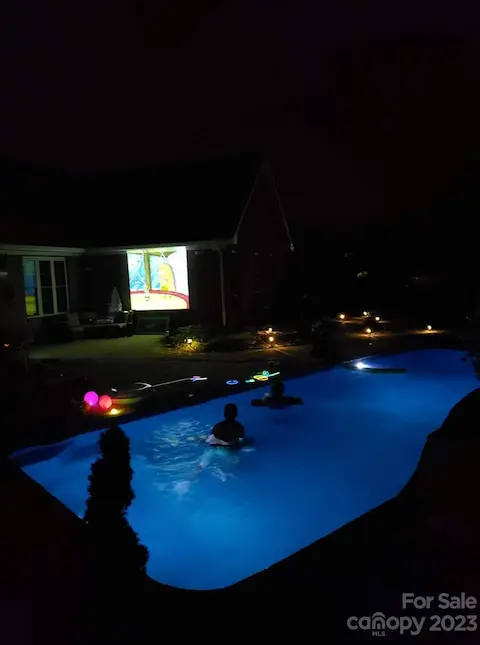Wanna watch movies while floating with your family and friends?  No problem!  Bring your projector and project directly onto the brick wall and play sound through the 2 outdoor Bose speakers.
