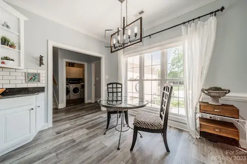 Breakfast room, laundry pantry straight ahead, primary bedroom to right of laundry