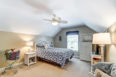 3rd bedroom above garage with 2 large walk-in closets