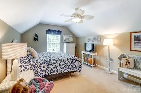 3rd bedroom above garage with 2 large walk-in closets