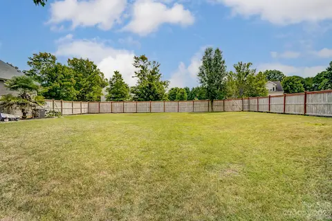 craftsman style fence with a large double gate and 2 side gates for easy access