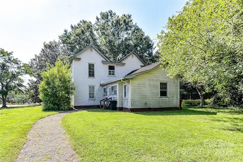 Currently has a home built in 1910, but the property's main value is in the land