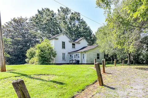 It has 300' of road footage on Catawba Avenue and 100' of road frontage on Potts Street. Appears to set up nicely for three lots with 100' frontage each and rear depth of 100' - roughly .215 acres each.