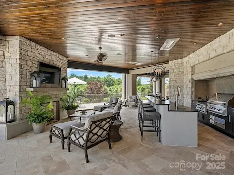 Outdoor bar area with retractable screens