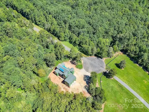 Ariel View - 2Story/Basement, 5 Bedroom,4.5 Bath Retreat beautifullynestled on 2.16 acre, private,cul-de-sac lot in exclusive,picturesque, new community,Cachet of Davidson!